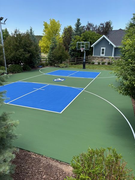 Green and Blue Backyard Multi-Sport Court with BYU Logo, Basketball and Pickleball by Precision Pro Courts